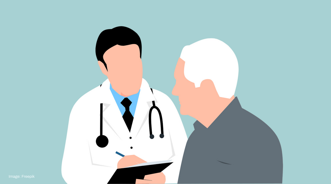 Image of a patient having a conversation with a health care provider.